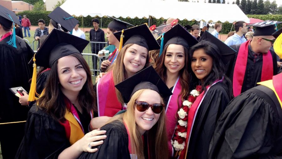 Students celebrating at the spring 2016 commencement ceremony. Photo credit: Ashley Narayan