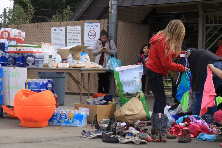 Many evacuees received donations from locals including clothing, shoes, and water. Photo credit: Miguel Orozco