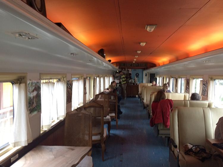 Inside view of the train shaped coffee shop. Photo credit: Jovanna Garcia