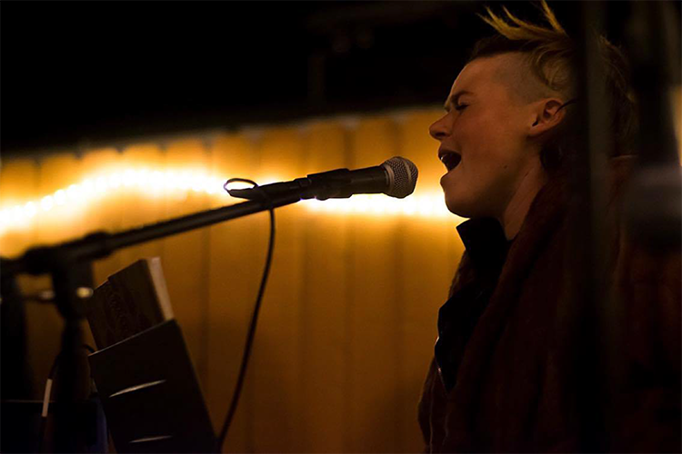 Masloski performing at an ACLU/Planned Parenthood benefit concert