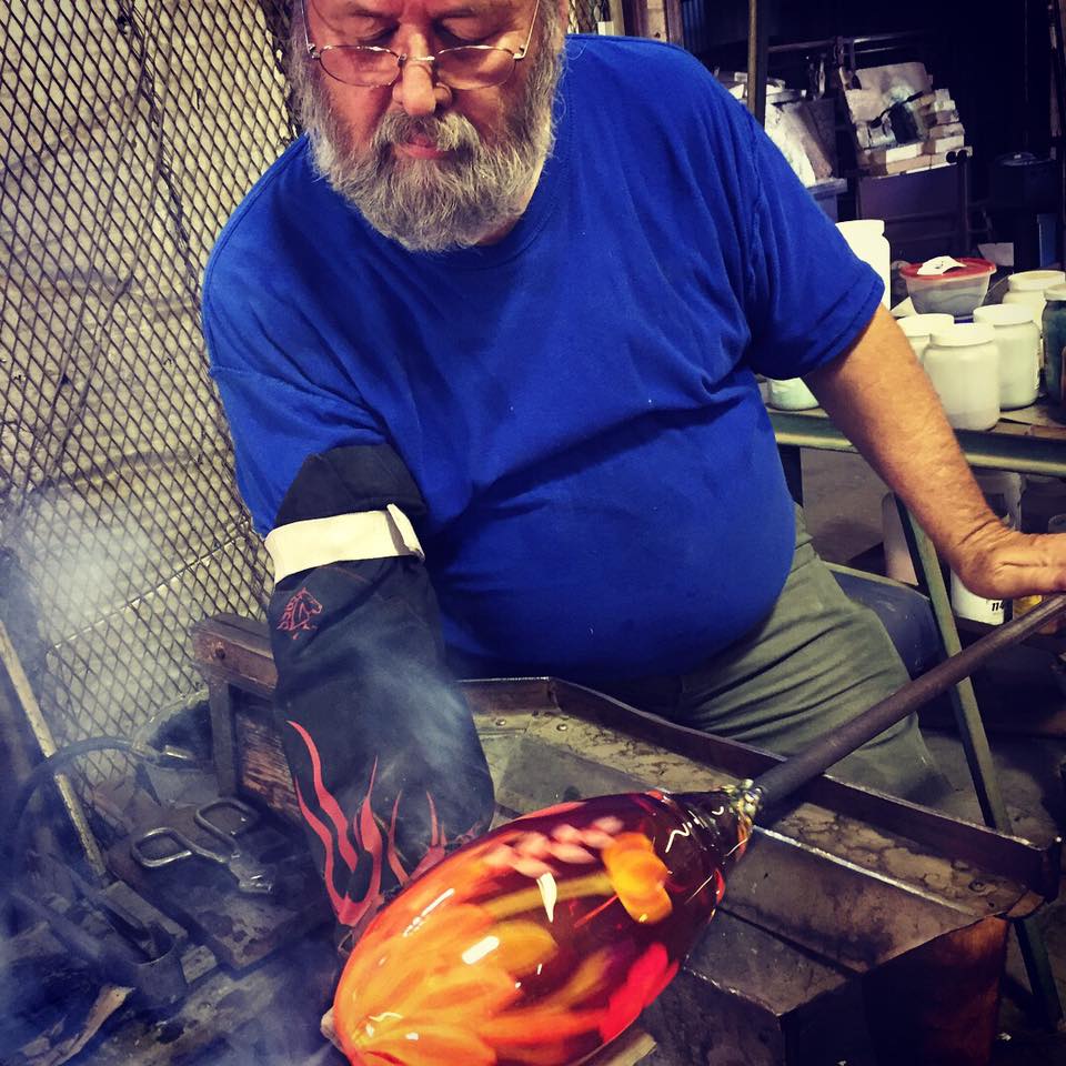 Master artist Bruce Sillars creating a fiery floral glass piece.

Photo courtesy of Brent Sheehan, Sillars glass art assistant