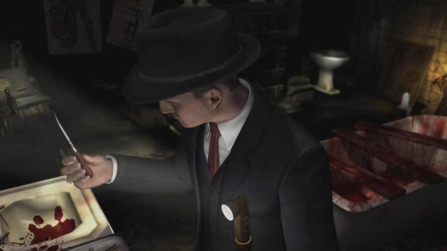 Cole Phelps investigates the hideout of a deranged serial killer. Image from rockstargames.com