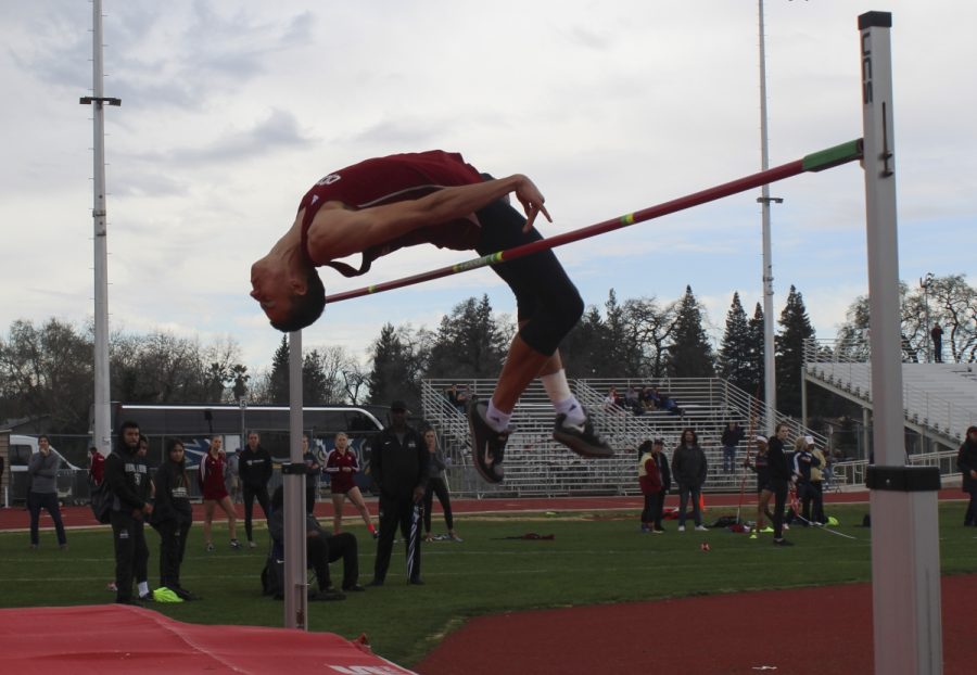 Despite+Saturday+morning+rain%2C+Chico+state+student+athlete+%26+high+jump+star+Tyler+Arroyo+skillfully+wraps+his+body+over+pole+set+at+6+foot+7+inches%E2%80%93+a+show+of+raw+athletic+ability.+Photo+credit%3A+Anne+Chamberlain