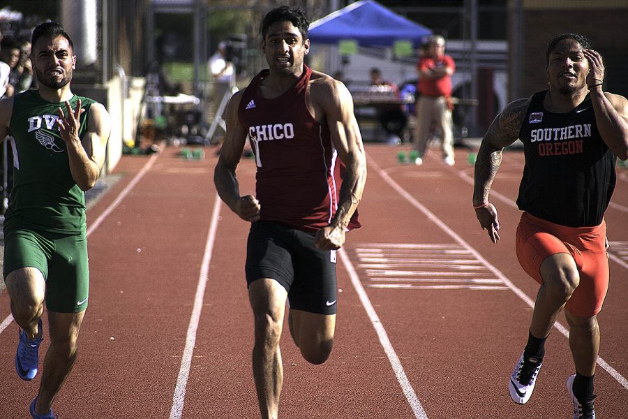 Karndeep Johl takes second place in the men's 100 meter dash. Photo credit: Martin Chang