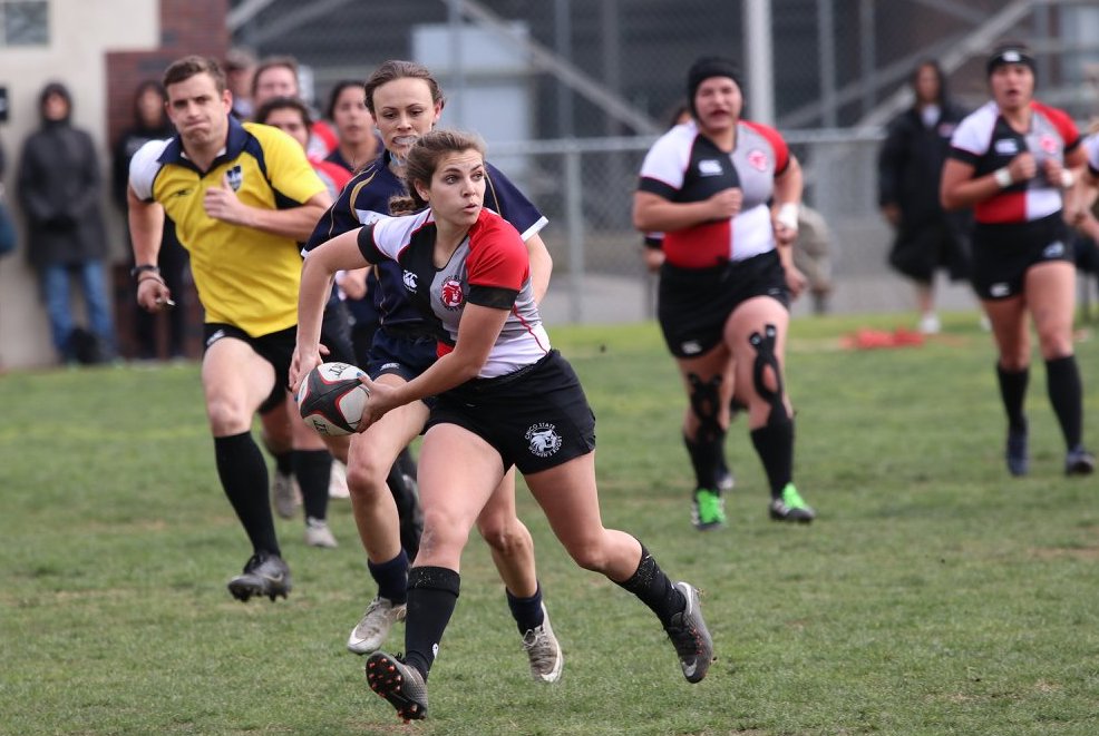 Darby McFall looking to make a pass in a home match against UC Davis. Photo Courtesy: John Cort