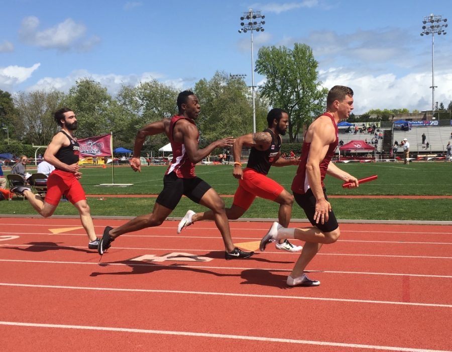 Chico States Derrick Shepherd and Windsor Jamison complete the transfer of the baton in the 4x100 relay on Saturday. The team finished third with a time of 42.75 seconds. Photo credit: Andrew Baumgartner