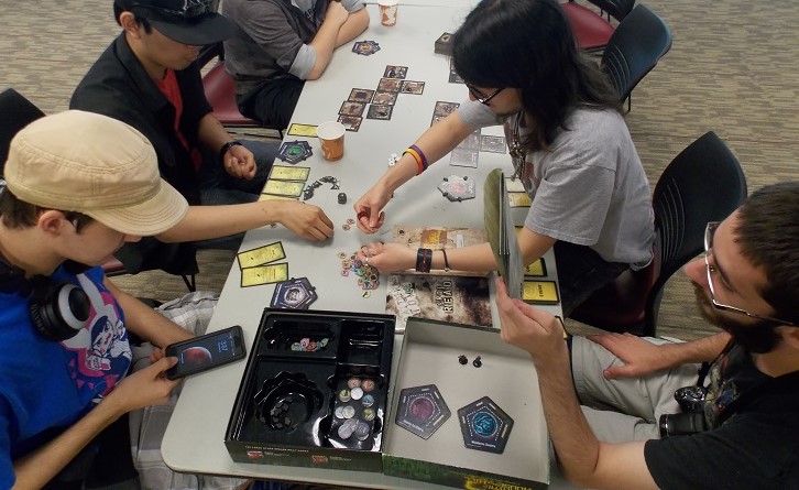 The game Betrayal at the house on the hill was played by students and members of Wildcat Gaming, From left-to-right, Julian Pierson, Aaron Dizon, Alexander Lopez, and Theron Rex Howard, Saturday during a character creation party. Photo credit: Josh Cozine
