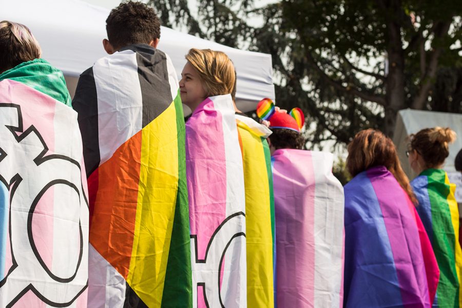A group of local teens display their LGBTQ+ pride Saturday.