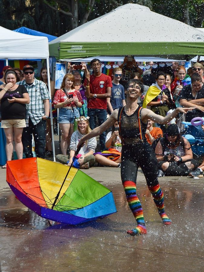 Performer Tucker Noir entertains onlookers with dance rendition to Singing in the Rain during the Stonewall Chico Pride celebration in the downtown plaza on Saturday. Photo credit: Olyvia Simpson