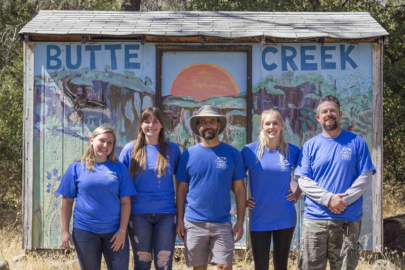 Left to Right: Ashley Manley, Kate Liggett, Jon Aull, Sierra Baker, Carter Moore. Staff poses for a picture at the Butte Creek Ecological Preserve on Friday, after their intern training session. Photo credit: Brian Luong