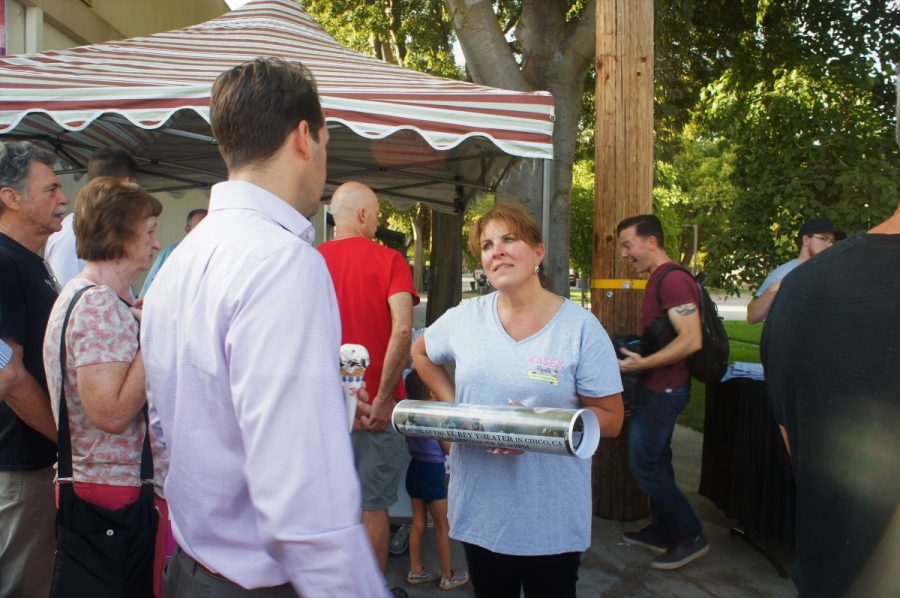 Kasey Reynolds talking to members of the community at the #StompOutHate ice cream social. Photo credit: Keelie Lewis