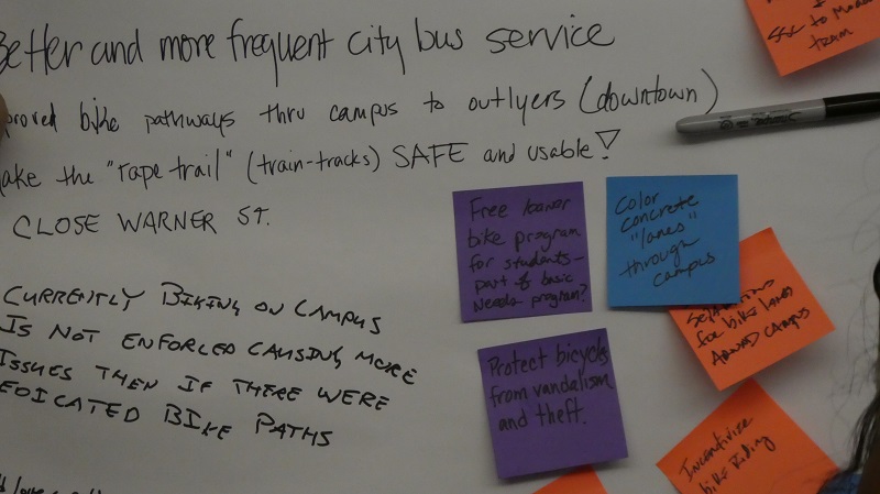 Several comments were both written and post-it noted about improving biking on, and near campus, Tuesday, at both FutureFest sessions. Photo credit: Josh Cozine