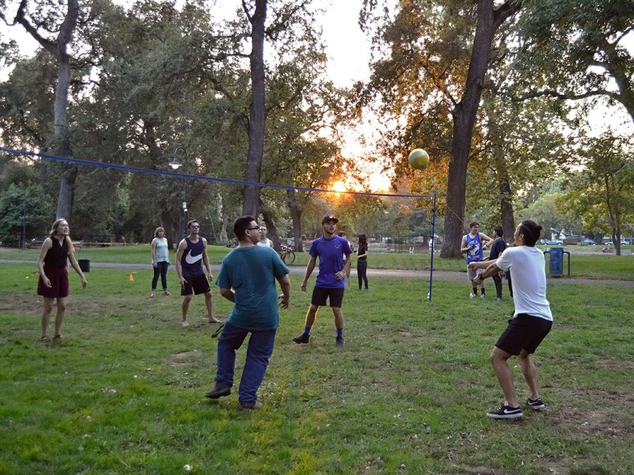 Students part of Christian Challenge hang out at One Mile over the weekend to barbecue and play a game of volleyball. Photo credit: Olyvia Simpson