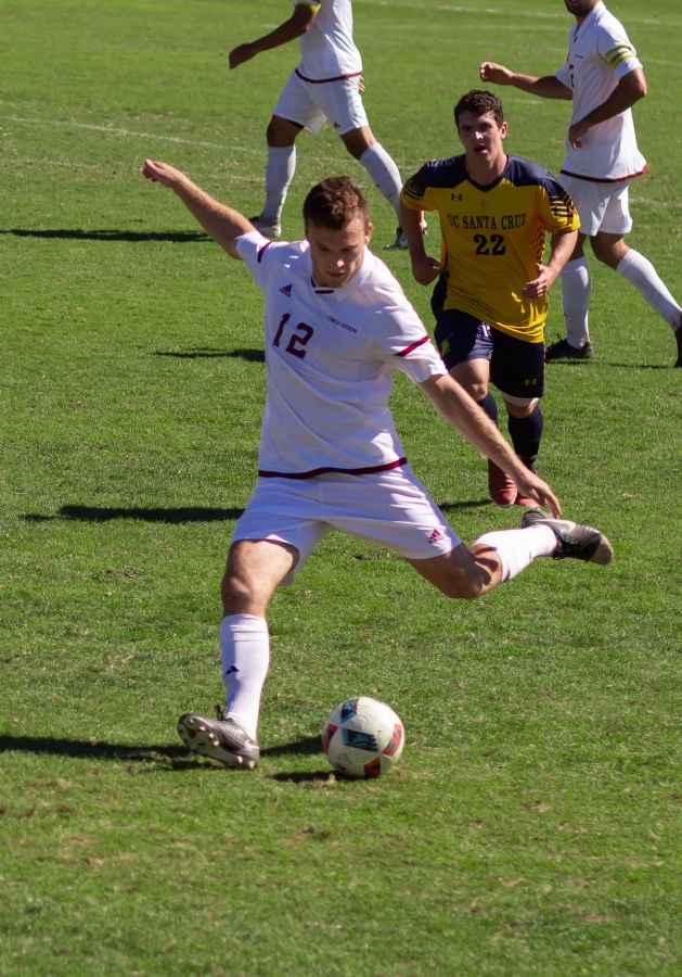 Joshua Belda delivers a pass down the field Sunday against UC Santa Cruz. Photo credit: Maury Montalvo