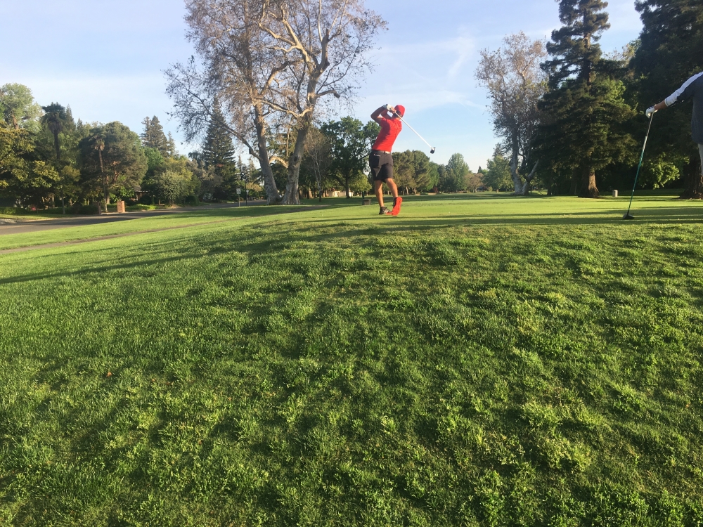 Kelley Sullivan tees off on day one of the 2018 CCAA Championships at Butte Creek Country Club in Chico in this archived photo. Photo credit: Andrew Baumgartner