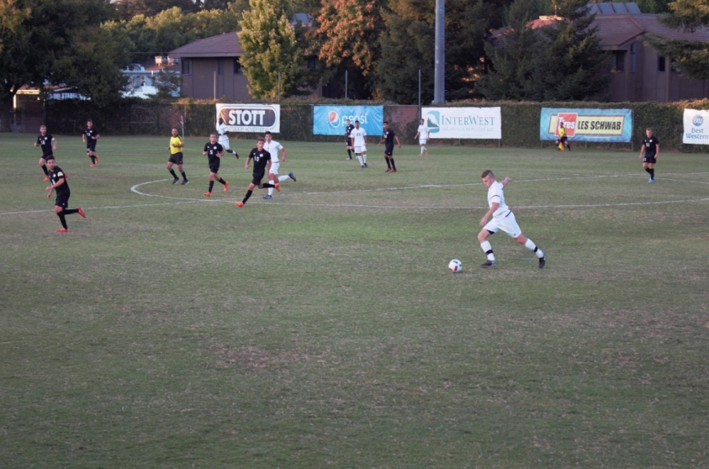 A Chico State defender strikes a free kick in a game against Seattle Pacific University in this archived photo Photo credit: Maury Montalvo