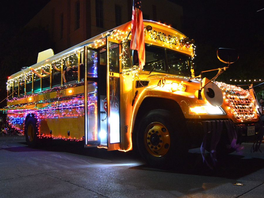 A Chico Unified School District bus proves at the Chico Parade of Lights that creativity does not stop with light decorations as any vehicle or object can be used as well. Photo credit: Olyvia Simpson