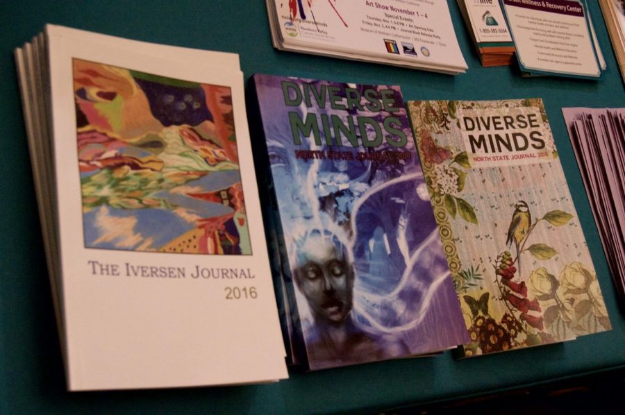The intimate art show featured journals available for purchase at the front of the building. Photo credit: Daelin Wofford