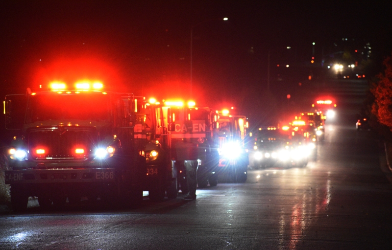 Several firetrucks lined up down East 20th Street late Thursday night to ensure Camp Fire flames didn’t cross over into the residential Chico area. This road and Skyway Road were the closest areas the fire got to residential homes in Chico.