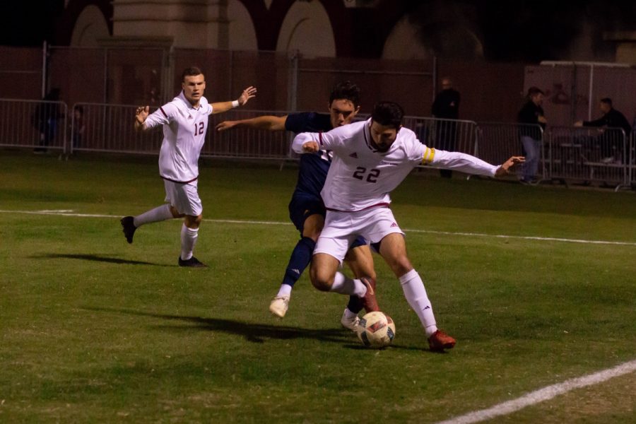 Chico State defender Garrett Hogbin keeps the ball away from UC San Diego in this archived photo. Photo credit: Maury Montalvo