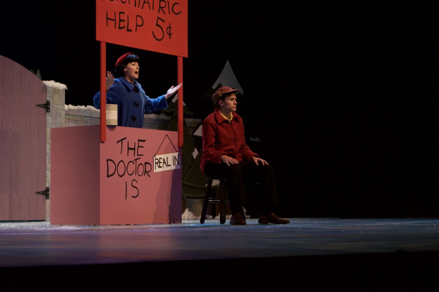 Charlie Brown getting "psychiatric help" from Lucy Van Pelt. Photo credit: Daelin Wofford