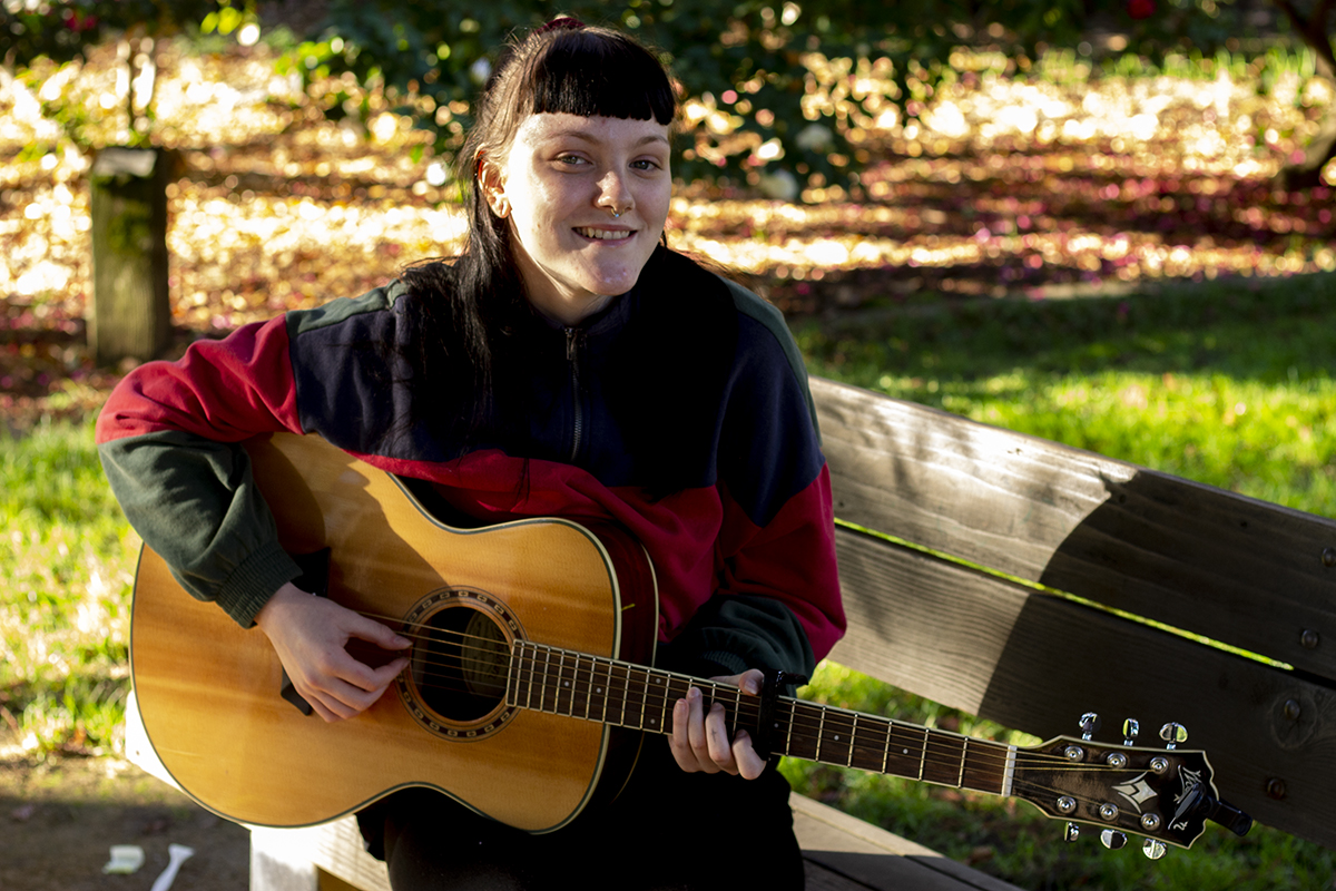 Nikki Renaud, artist of the week, with her guitar on Thursday. Photo credit: Dominique Wood