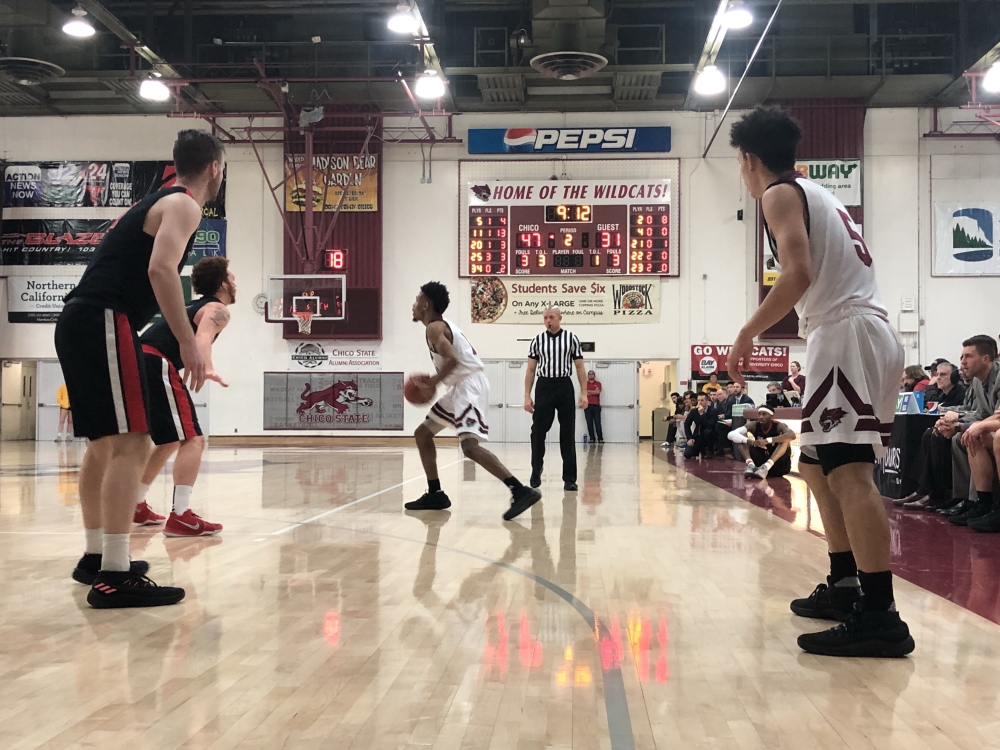 Kevin Warren and Isaiah Brooks operating the Chico State offense against Cal State East Bay on Saturday. Photo credit: Wesley Harris