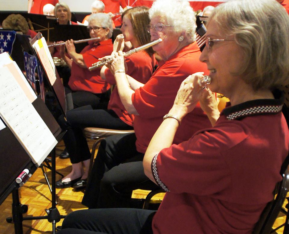 The Chico Community Concert Band flute section plays at the Chico Elks Lodge on Nov. 11, 2016, during a Veterans Day program. From left: Linda Gould, Carolyn Hamilton, Jackie Corrie and Sanda Doerschlag. Image courtesy of Mark Plenke.