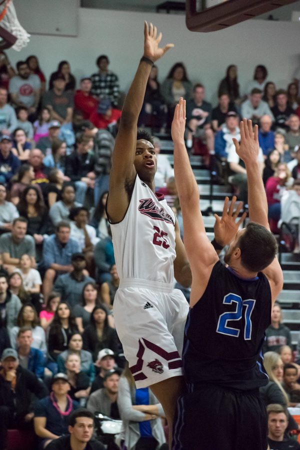 Sophomore Justin Briggs avoids defense and finds an open shot in a Chicos playoff matchup against Cal State San Bernardino last season in this archived image. Photo credit: Kate Angeles