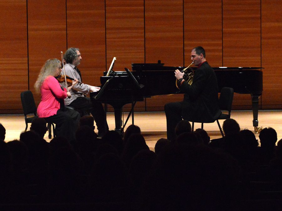 Terrie Baune, John Chernoff and Dan Nebel perform Horn Trio in E Flat major. “The horn isn’t typically an accompaniment of piano and violin,” Nebel said, but the French Horn addition enhanced the composition of the piece. Photo credit: Olyvia Simpson