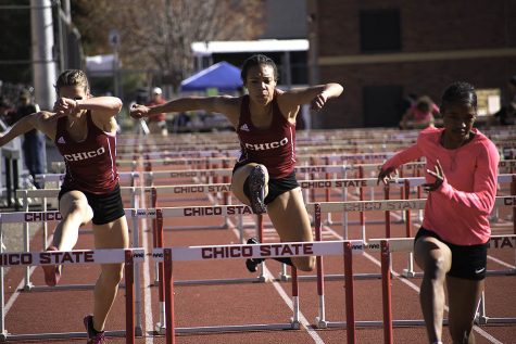 Michelle Holt competing in the 100 hurdles at the 2018 Wildcat invite on March 10. Photo credit: Martin Chang