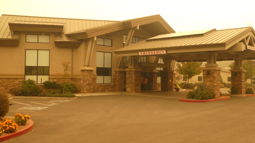 The entrance to the Feather River Hospital Emergency Room just after the Camp Fire burned through Paradise. Adventist Health now says the entire campus area on Pentz Road will not be re-opened anytime soon. Photo credit: Josh Cozine