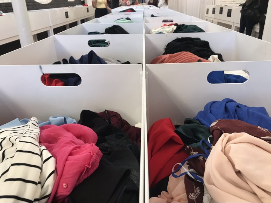 Lulus Outlet store bins full of unsorted clothes Photo credit: Yaritza Ayon