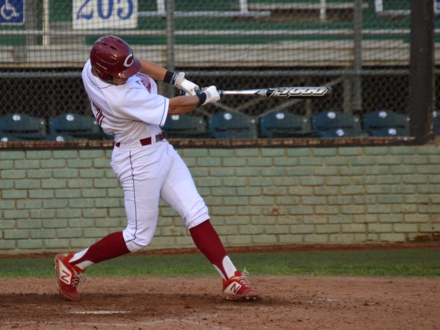 Eddie Zavala takes a swing in a game against Cal State San Marcos on April 5, 2019. Photo credit: Olyvia Simpson