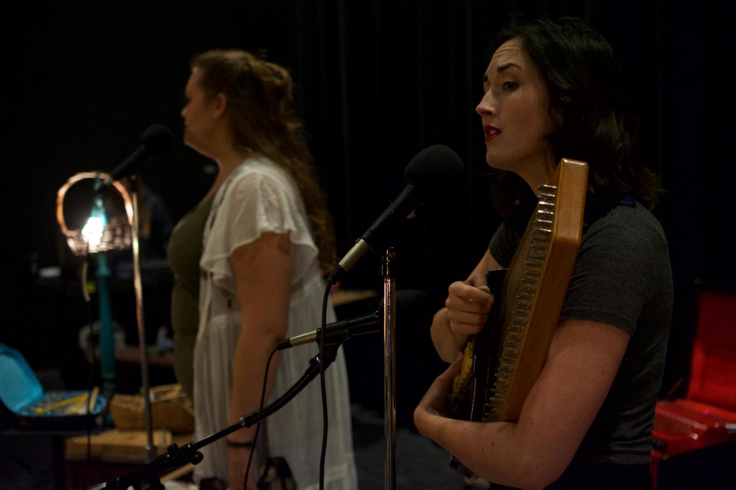 Band member Rebecca Rowland (left) performing in "Ghost Quartet" at Blue Room Theatre. Photo by House of Ushers Productions.