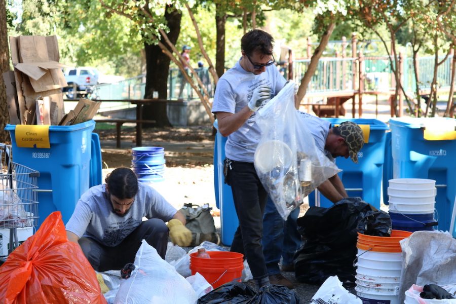 Volunteers grabbed cans, glasses, and other recyclable materials out of bags like these. Photo credit: Melissa Herrera