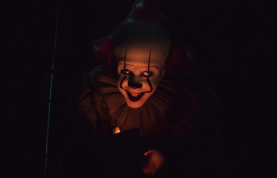 Bill Skarsgård plays as Pennywise the Dancing Clown, a cosmic evil entity that terrorizes and hunts the children of Derry, Maine. 

IT: Chapter Two official website photo