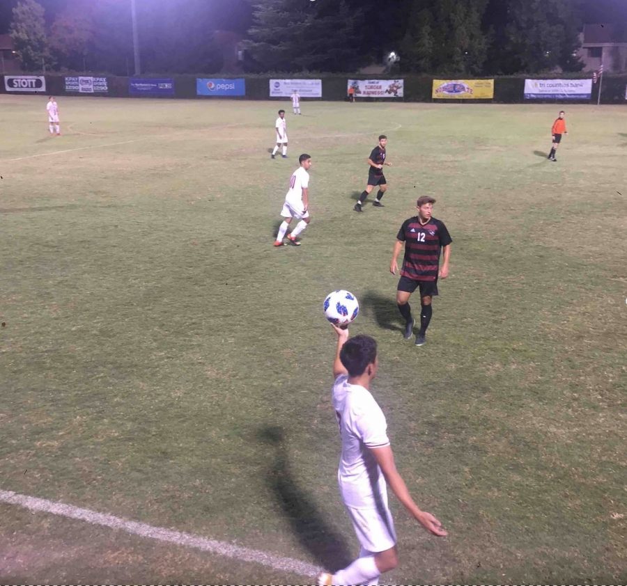 Anthony Kaskie getting in position during a throw-in against Holy Names University. Aug. 31, 2019. Photo credit: Karina Cope