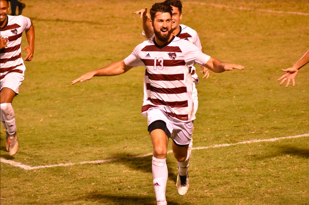 Garrett Hogbin celebrating in a victory run. Photo credit: Hana Beaty