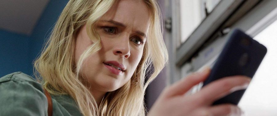 Quinn Harris (Elizabeth Lail) downloads an app that tells her she has only three days to live.
(STX Films)