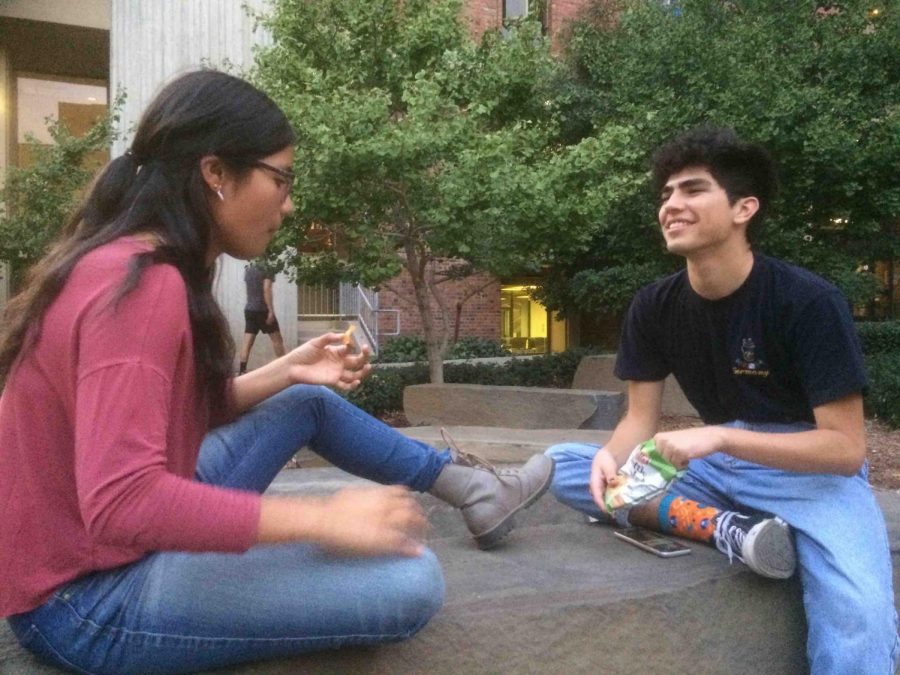 Tzanda Mendes and Nathan Zamudio wait for the film to start outside The Hub. Photo credit: Emily Neria