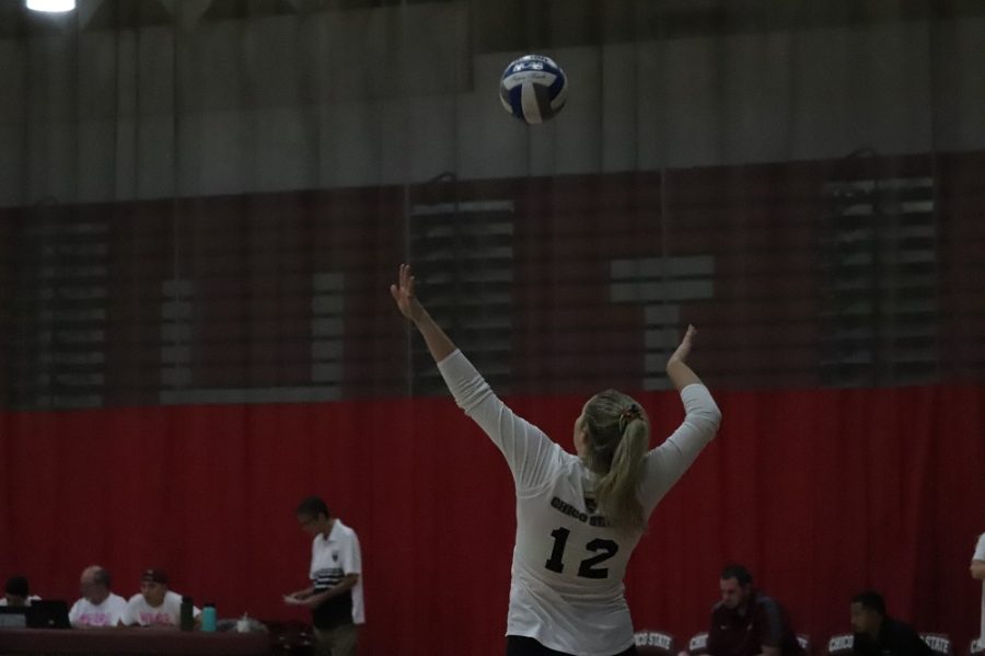 Makaela Keeve serving the ball to the other team. Photo credit: Mary Vogel