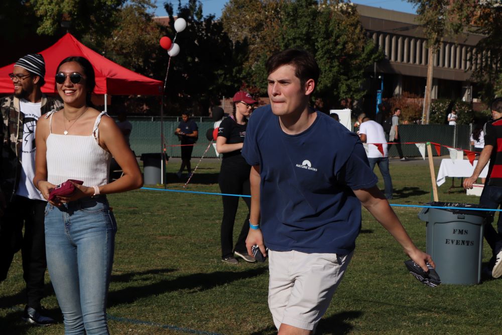 A player focuses on his target as he winds up for a toss. Photo credit: Mary Vogel