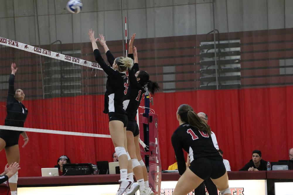 Kim Wright and Kelly Jacome work side by side to prevent San Francisco from hitting the ball to their side. Photo credit: Melissa Herrera