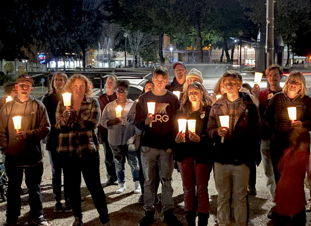 People congregate together and had a candlelit vigil. Photo credit: Hana Beaty