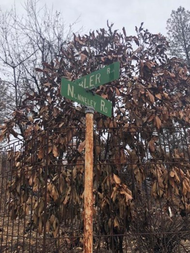 The street sign on the corner of Kibler and Nunneley roads post Camp Fire. Photo credit: Trenton Taylor