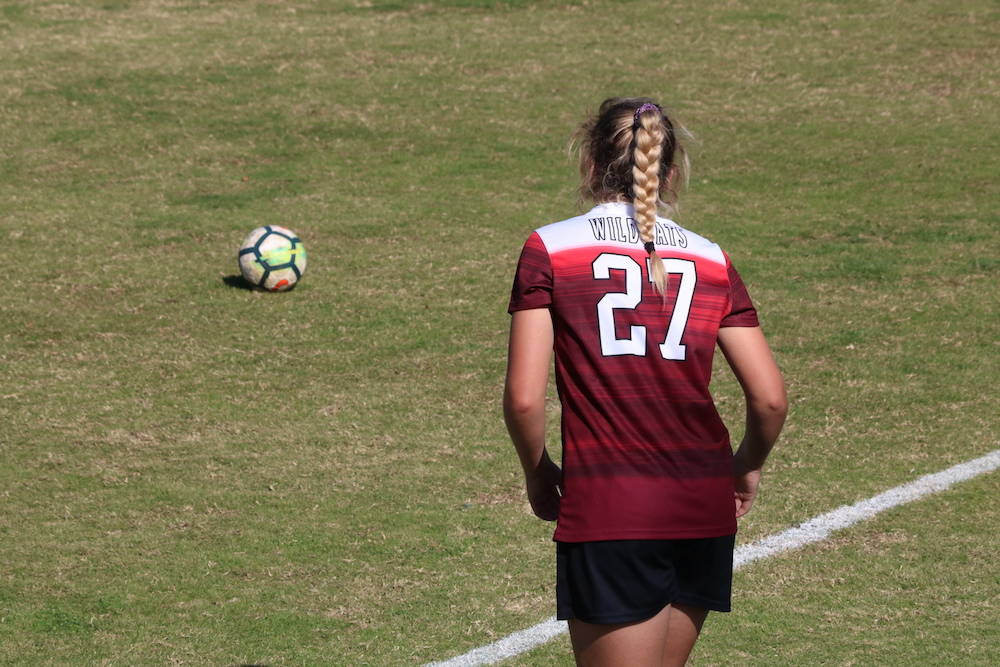 Freshman Liz Geraghty positioning her free kick against Sonoma State. Photo credit: Mary Vogel