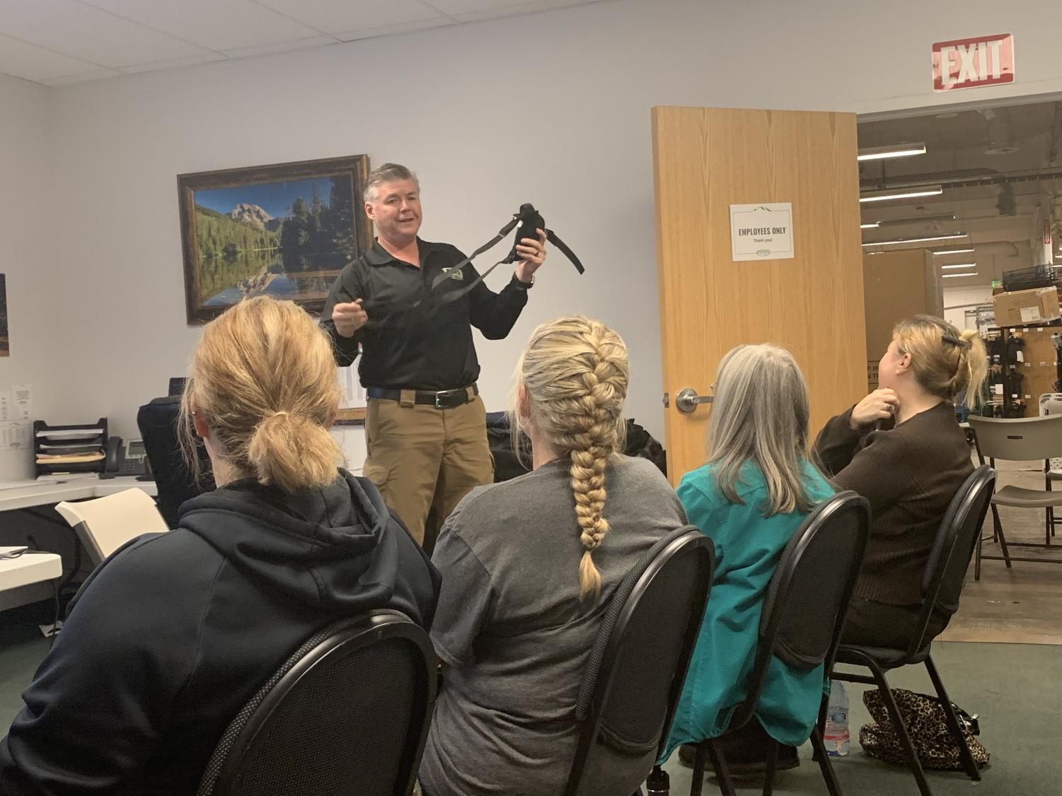 Ted Lidie showing his students what a shoulder halter looks like. Photo credit: Angelina Mendez