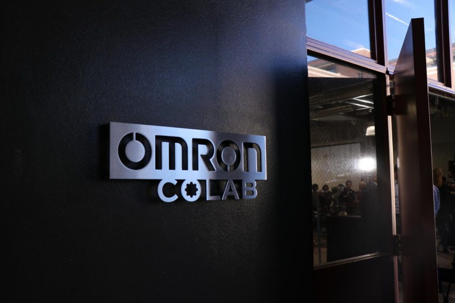A sign that reads “OMRON COLAB: This classroom & Laboratory made possible through the generous support of Omron Corporation. Dedicated February 10, 2020 California State University, Chico.”
