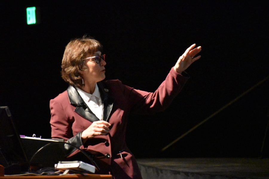 Gayle Hutchinson presents information during her presidential address in the Performing Arts Center at Chico State.